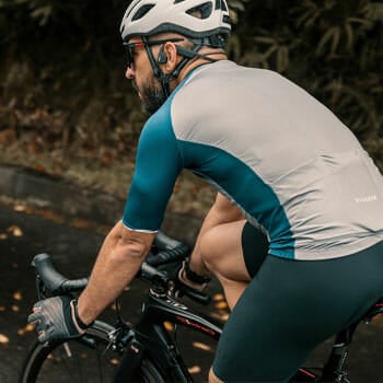 A man cycling outdoors