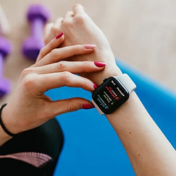 woman looking at her watch