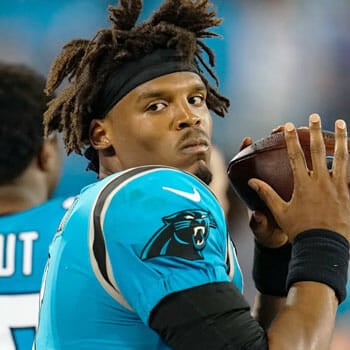 cam newton wearing a football jersey