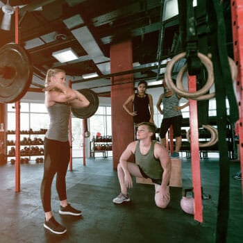 friends doing cross fit exercise together