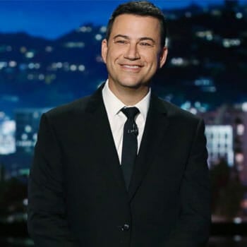 portrait image of a smiling jimmy kimmel on during a tv show