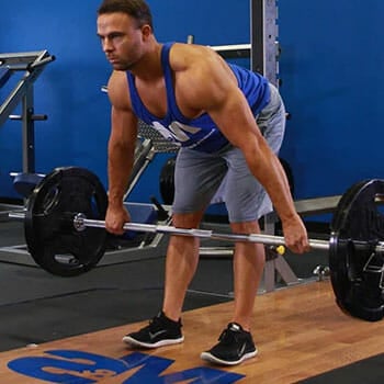 A person doing stiff legged deadlifts