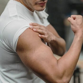 close up image of a man's biceps