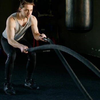 man using ropes for cardio