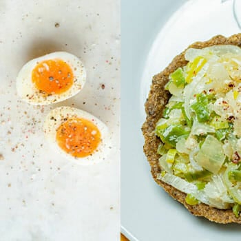 boiled egg with pepper, bowl filled with salad