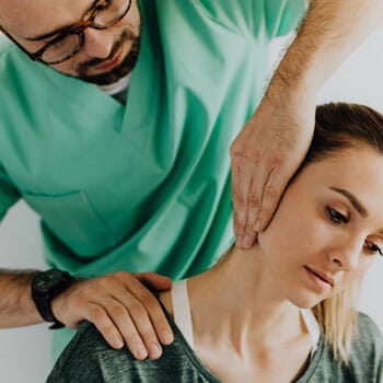 physical therapist curing an injury