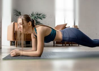 woman planking at home