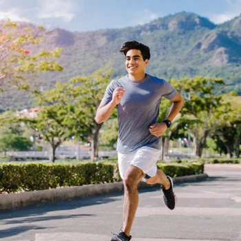 A guy running outdoors