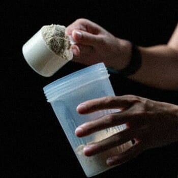 Pouring creatine inside a contrainer