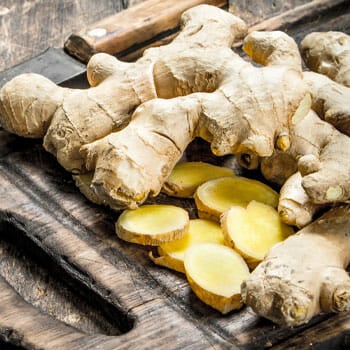 slices of fresh ginger on a tray
