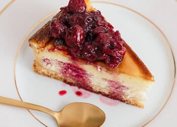 plate with cheesecake and fork