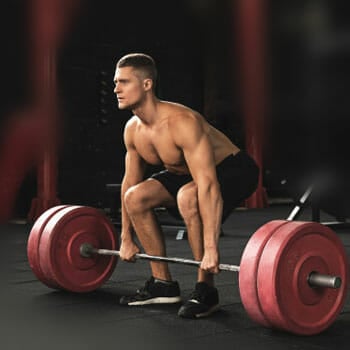 man in a deadlift position