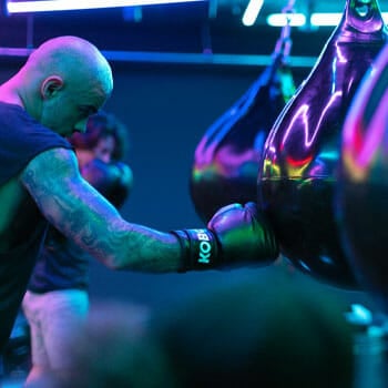 man using a punching bag