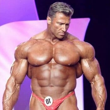 Gunter Schlierkamp shirtless on stage