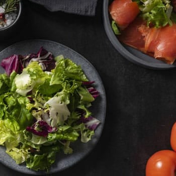 plate filled with green salad leaves