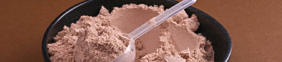 Powdered creatine on a container