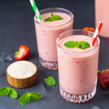 A whey protein smoothie on a glass