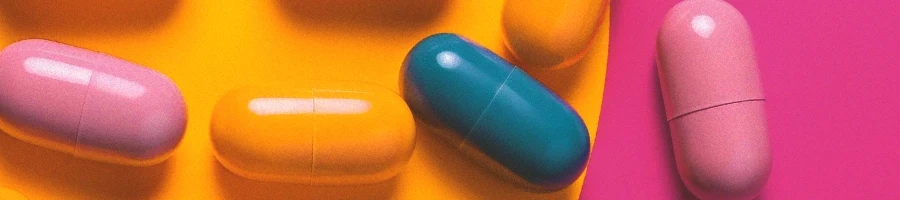 A top view of vitamin capsules