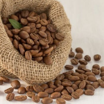 coffee beans inside a small brown sack