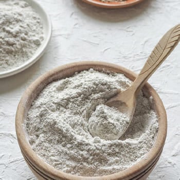 white powder on a bowl with spoon on it