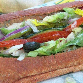 sandwich with vegetables in it