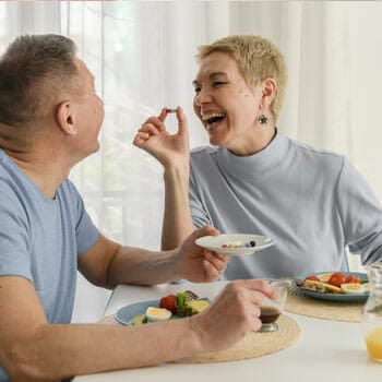 old couple eating together