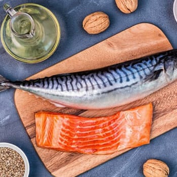 salmon fish, oil and seeds in a table