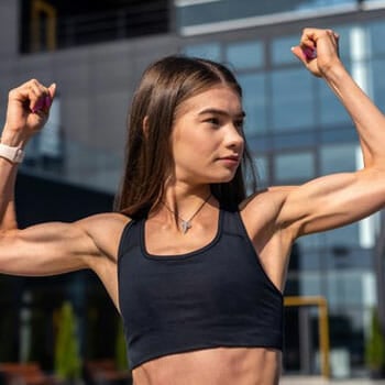 woman flexing her biceps