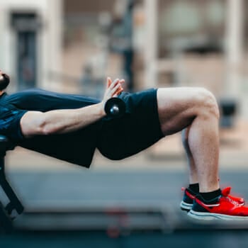 A man performing a hip thrust