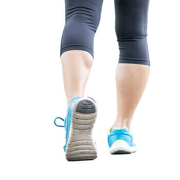 A woman stretching her heel and toe