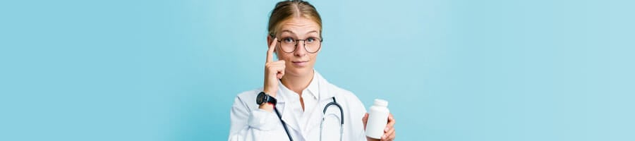 medical person holding out a capsule bottle while thinking
