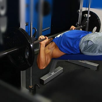 man in a decline bench press position