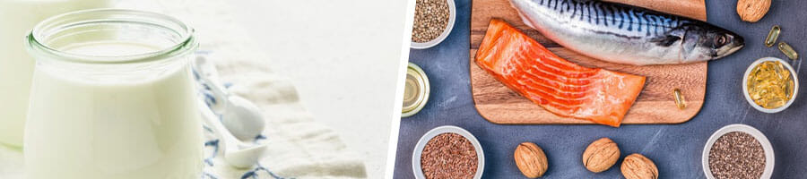 glass of milk, and fish on a tray with bowls of seeds