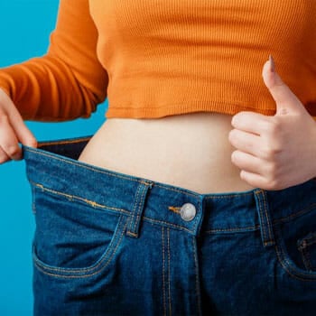 woman stretching out his loose pants