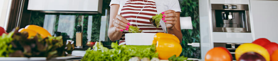 A woman preparing her strict diet meal