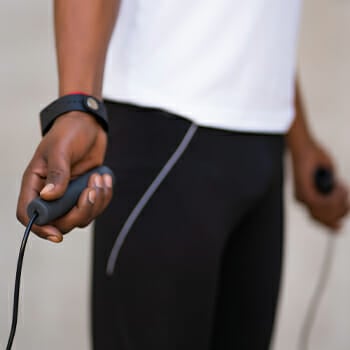 A man holding his jumping rope