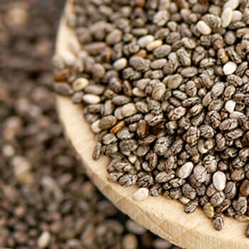 Overflowing chia seeds on a bowl