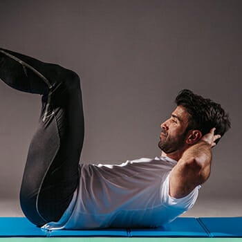 A man performing abdominal crunches