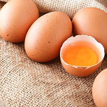 Eggs on a brown rough cloth