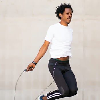 A person doing jump rope in motion