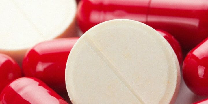 Close up image of red and white supplements