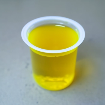 Close up shot of healthy urine in a cup