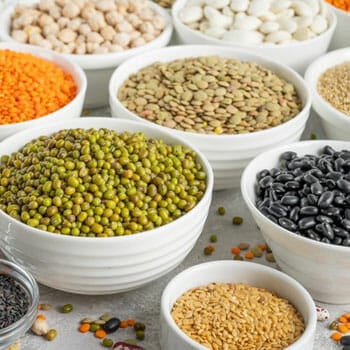 different beans filling bowls and plates