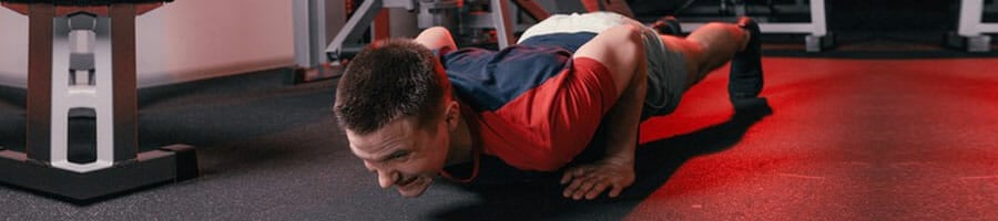 man in a push up position