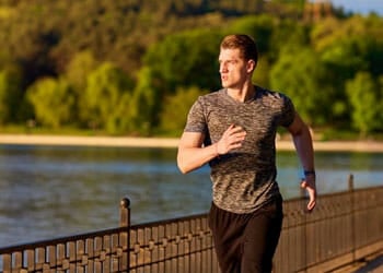 man jogging at a park