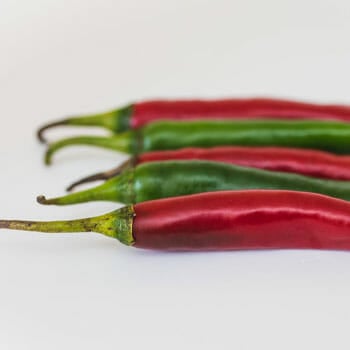 chili peppers in red and green