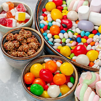 Sweets and candies in a different bowl