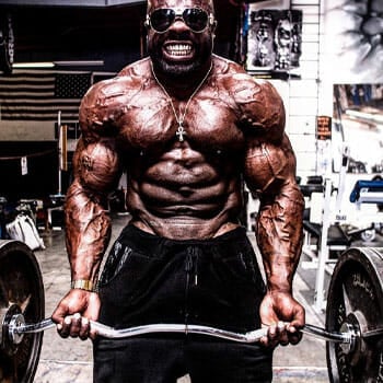 Kali Muscle doing heavy weightlifting