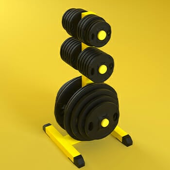 Weight plates on a yellow rack