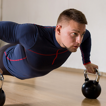Person training with kettlebell